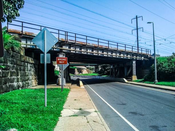 istock Old Stone Railroad Bridge over exit from Route 1 North to Highway 29 1164232611