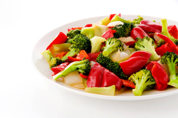 Stir fry Red Bell Pepper and broccoli onion on white plate