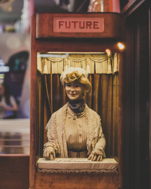 Old Fashioned Fortune Telling Machine Old Fashioned Fortune Telling Machine with female robot fortune telling machine stock pictures, royalty-free photos & images