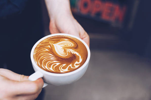 istock A cup of coffee in male hands. 1164245544
