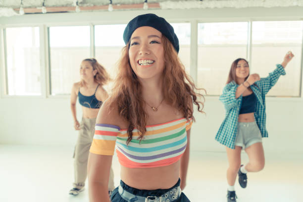 istock Young female dancers dance in studio 1164246523