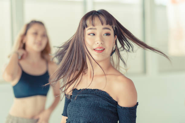 istock Young female dancers dance in studio 1164246548