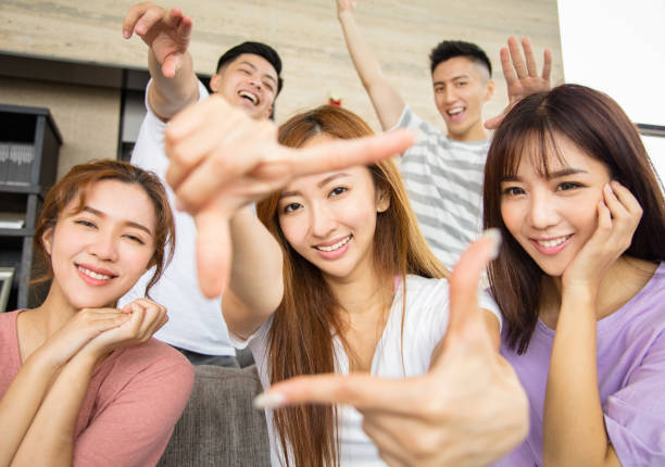 istock happy young people with looking and style gesture 1164246639