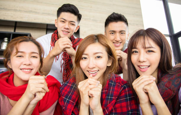 Young people having fun and celebrating chinese new year