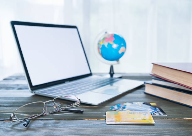 istock Eye glasses and book beside the window 1164246715