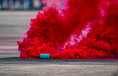 Colorful smoke bombs action in showing.