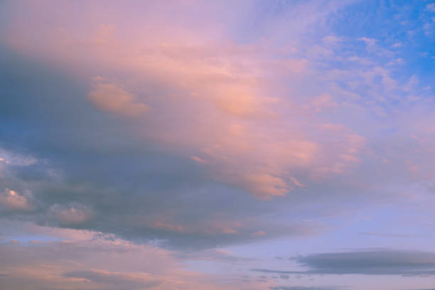 istock Beautiful sky with clouds at sunset - full frame image of sky 1164254940