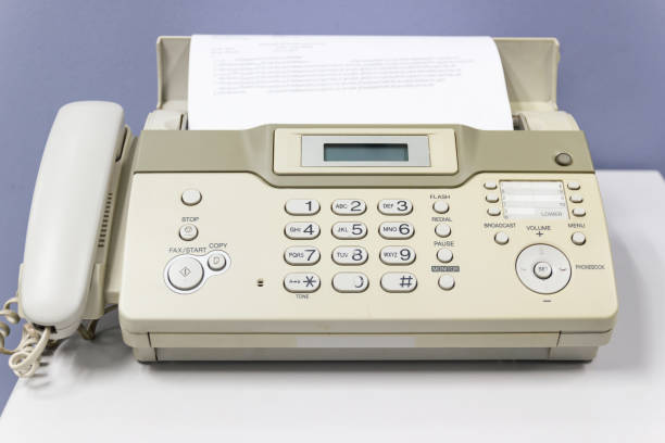 istock The fax machine for Sending documents in the office concept equipment 1164255668