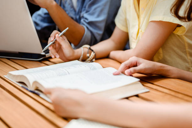 istock Young students campus helps friend learning tutoring.People, learning, education and school concept 1164255773