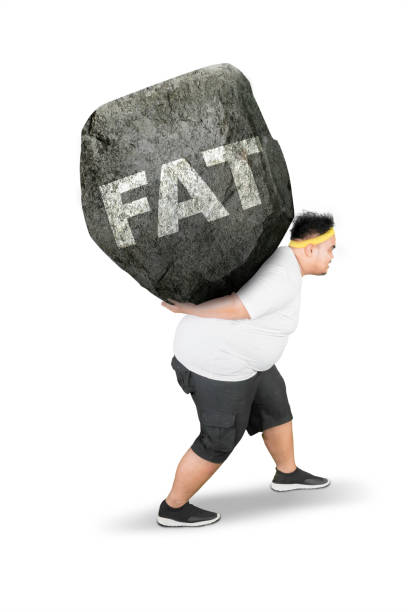 istock Young obese man carrying fat word on studio 1164260006