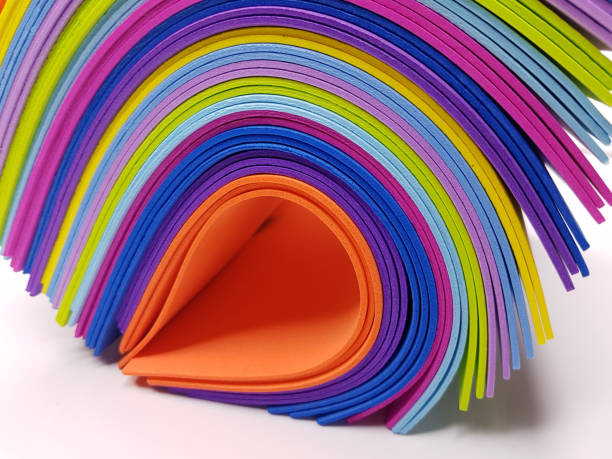 istock Colorful bright spectrum papers as an abstract background. 1164260110