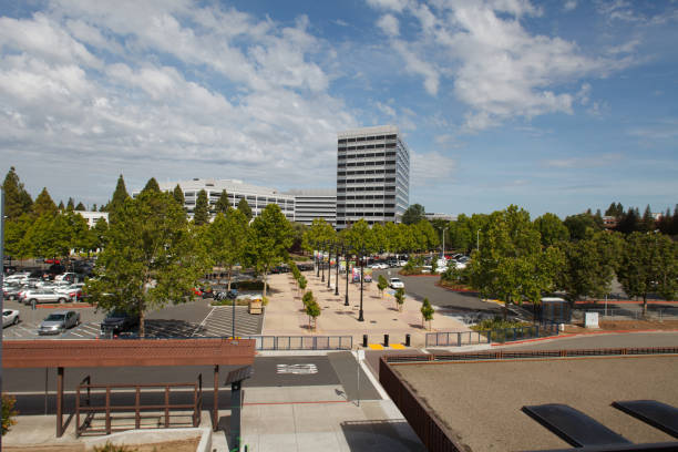 View of Office Buildings from Concord BART Concord California, U.S.A. - May 23 2019: An image of the Concord B.A.R.T. station parking lot and office buildings taken from the the train platform. contra costa county stock pictures, royalty-free photos & images