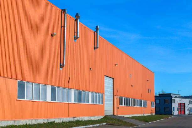 istock Facade of a storage building in port 1164263599