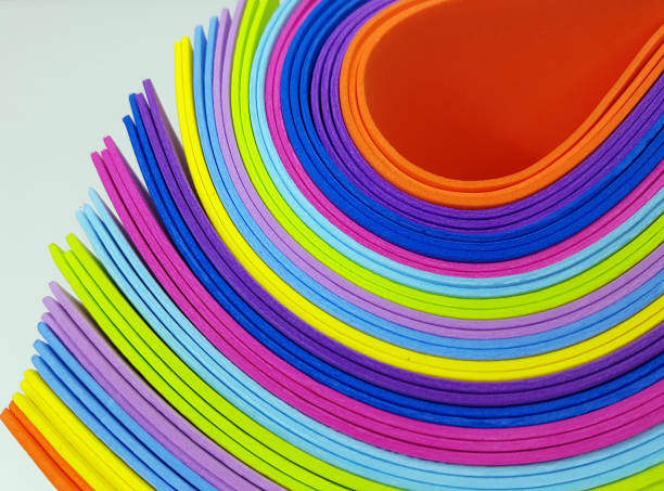 istock Colorful bright spectrum papers as an abstract background. 1164263661