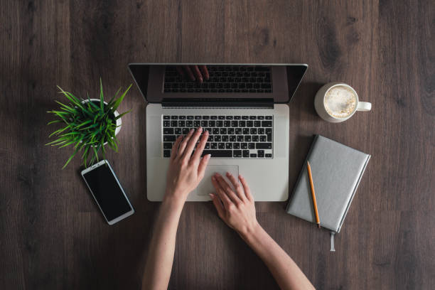 istock Woman working on a laptop. 1164265593