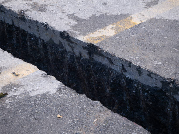 istock installing concrete drains on the side of the road 1164270966