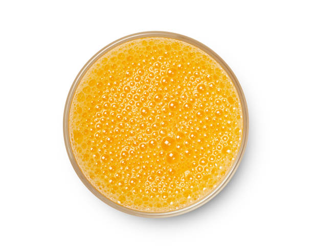 istock glass of fresh orange juice isolated 1164271907