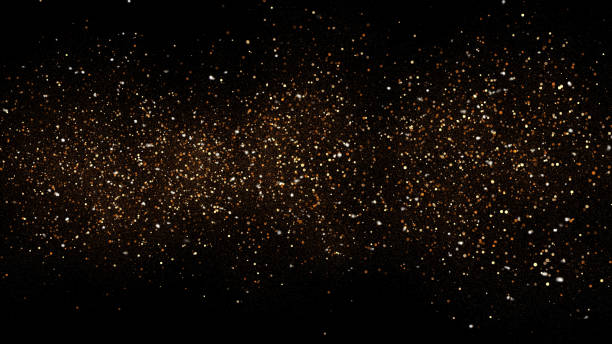 istock 3d Illustration, Small gold dust, graphics of fire flakes, particle points and yellow-orange circles at the centre of the frame 1164274683