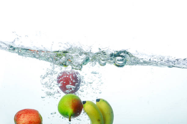 istock Falling Fruits Into Clean Water 1164275697