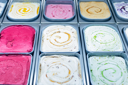 Icolorful ce cream bar. Ice cream in containers