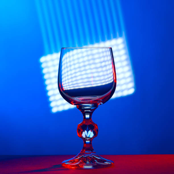 istock Crystal wine glass on blue abstract background 1164288609
