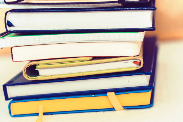 istock Notebooks piles, education back to school background with copy space for text 1164291215