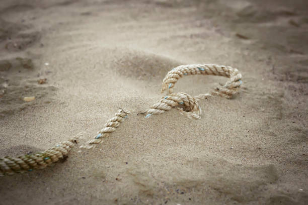 istock background old sea rope on the beach 1164293562
