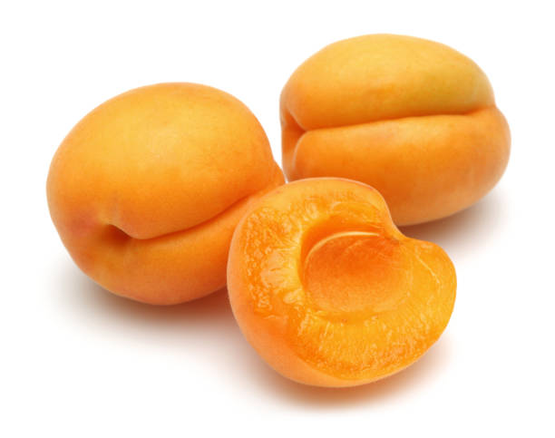 Fresh ripe apricots isolated on white