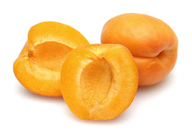 istock Fresh ripe apricots isolated on white 1164303990