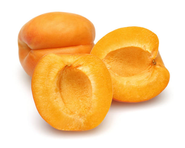 istock Fresh ripe apricots isolated on white 1164304617