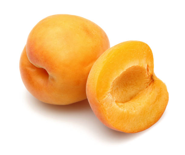 istock Fresh ripe apricots isolated on white 1164304718