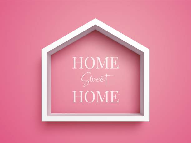 White frame in shape of house on pink background with inscription 