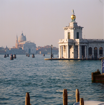 Venezia, Veneto, Italy - St mark's basin. Dogana da Mar toward the church of Redentore at sunrise-