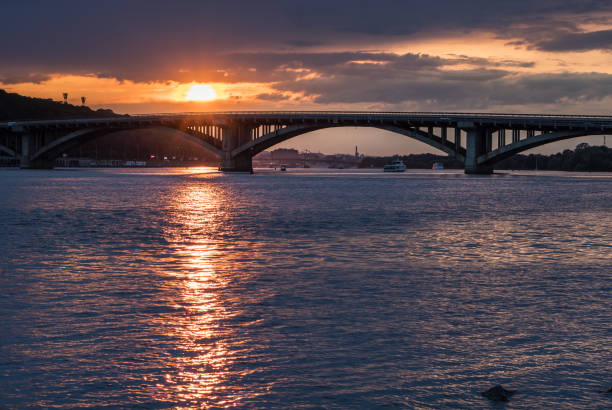 istock Scenic sunset view on a metro bridge and Dneper River from Hydropark in Kyiv, Ukraine 1164310965