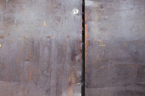 istock Metal door rusty corroded texture background. 1164312712