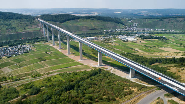 Construction site of Hochmoselbruecke B50, bridge over Mosel valley - aerial view