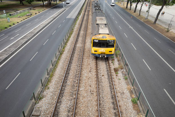 Lisbon, Portugal. June 5, 2019: A train is moving torward the lisbon train station.