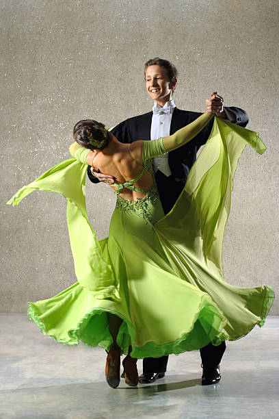 dancing couple Young dancing pair in classical suits tail coat photos stock pictures, royalty-free photos & images