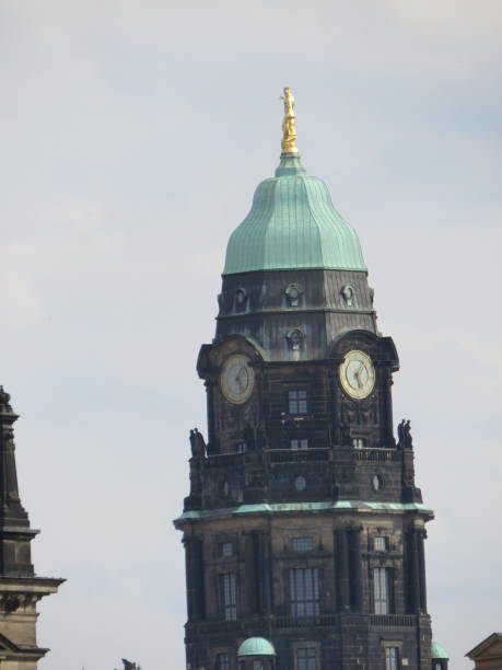 istock golden figures on the roofs of dresden 1164318610