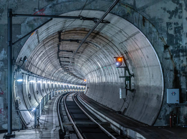 istock Illuminated Railroad Tracks In Tunnel 1164326463