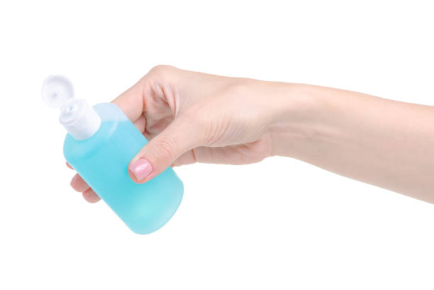 istock Bottle acetone nail polish remover in hand 1164329922