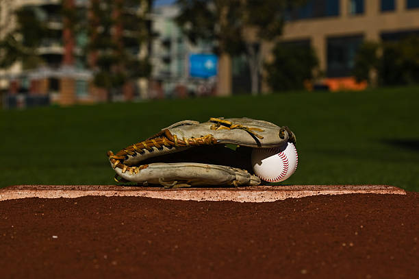 istock Baseball in glove on the field 116433487