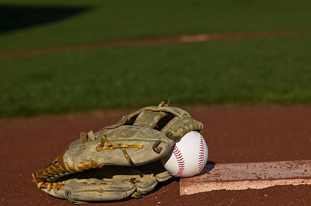 istock Baseball in glove on the field 116433509