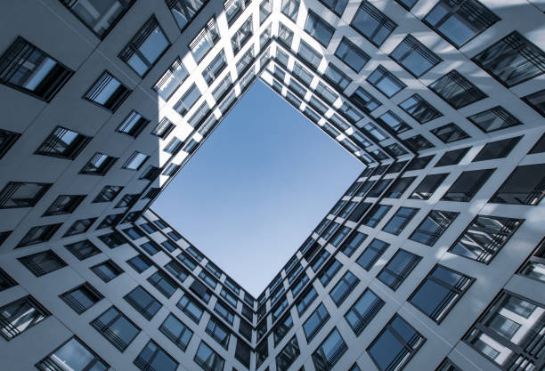 istock Directly Below Shot Of Modern Buildings Against Sky 1164335412