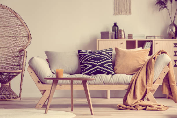 istock Wicker peacock chair in elegant living room interior 1164337446