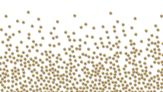 Golden balls scattered on white background