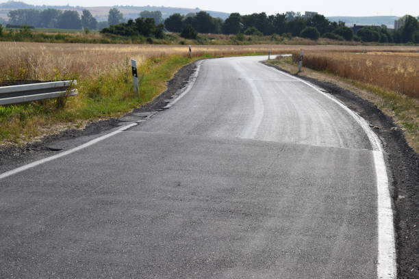 istock twisted road during harvest time in rural Eifel 1164341139
