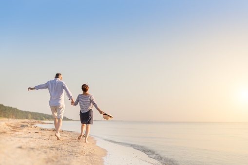 Happy senior couple at beach