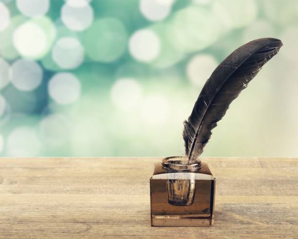 istock Quill pen with inkwell. 1164344134
