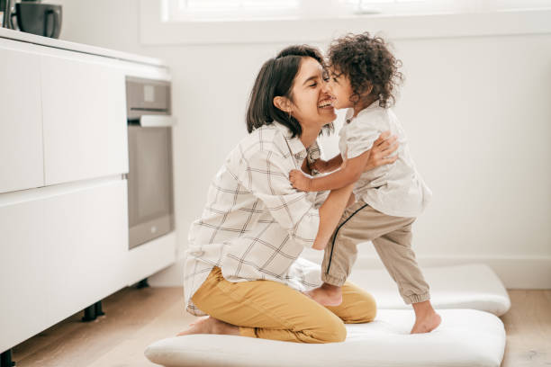 istock Kissing and hugging your child 1164344835